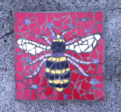 bee paving stone on ground - Copy.JPG